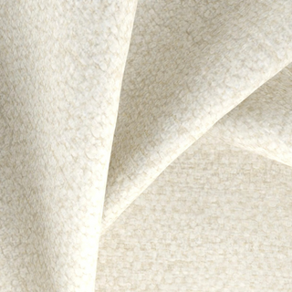 Close-up of textured beige fabric with geometric pattern