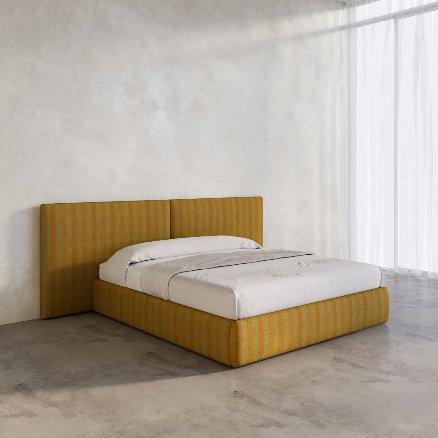 Long Time Bed Frame in Kvadrat stripe fabric in a micro cement bedroom